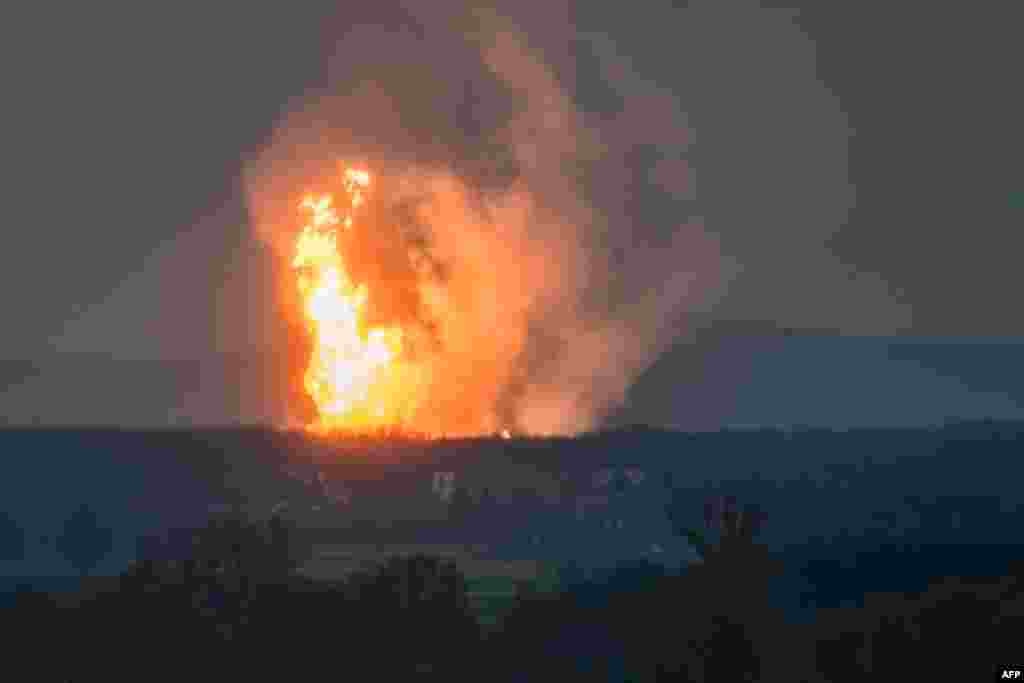 An explosion rips Austria's main gas pipeline hub and sends a fireball into the sky, at Baumgarten, Vienna.