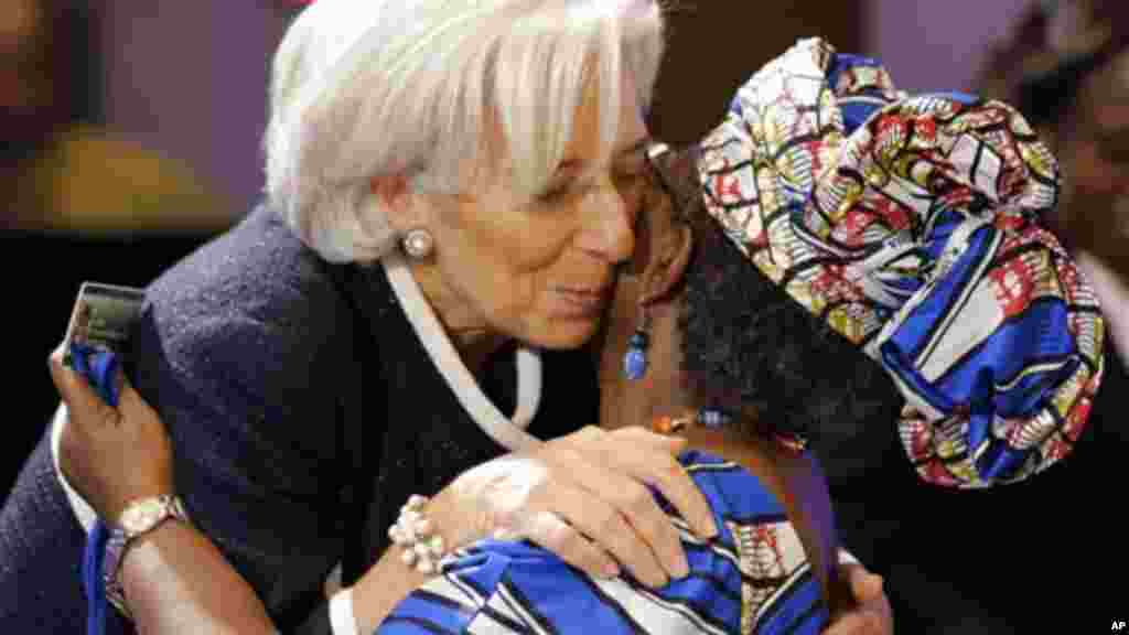 IMF Managing Director Christine Lagarde, left, greets, Ngozi Okonjo-Iweala, Finance Minister of Nigeria, before a meeting of the G-24, during the Spring Meetings of the World Bank Group and the International Monetary Fund.