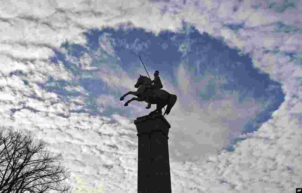 Blue sky clears up over a war monument in Duesseldorf, Germany.