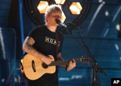Ed Sheeran performs "Shape of You" at the 59th annual Grammy Awards on Feb. 12, 2017, in Los Angeles.