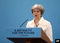 Thủ tướng Anh Theresa May phát biểu tại Diễn đàn Mùa Xuân của Đảng Bảo thủ ở trung tâm London, ngày 17 tháng 3, 2018.