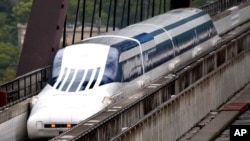 Japan's Magnetic Levitation, or linear motor car MLX01-901A, runs on a rest course of Yamanashi Experiment Center in Tsuru, Japan, Tuesday, May 11, 2010. (AP Photo/Itsuo Inouye)