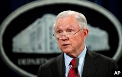 FILE - U.S. Attorney General Jeff Sessions speaks during a news conference at the Justice Department in Washington.