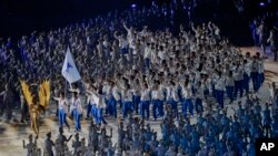 The combined Koreas flag bearer's march into the Gelora Bung Karno Stadium during the opening ceremony for the 18th Asian Games, Jakarta, Indonesia, Aug. 18, 2018. 