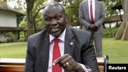 FILE - South Sudan rebel leader Riek Machar speaks during an interview in Nairobi, Kenya, July 8, 2015.