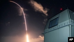 Photo provided by the U.S. Missile Defense Agency (MDA) shows the launch of the U.S. military's land-based Aegis missile defense testing system, that later intercepted an intermediate range ballistic missile, from the Pacific Missile Range Facility on the