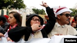 Les Tunisiens manifestent contre le retour des djihadistes dans les rues de Tunis, Tunisie, le 8 janvier 2017.