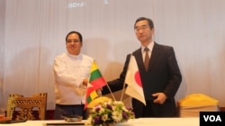 မြန်မာ- ဂျပန် သီလဝါ စီးပွါးရေးဇုံ အကျိုးတူပူးပေါင်းတည်ဆောက်ရေးသဘောတူညီချက် စာချုပ်မူကြမ်း လက်မှတ်ရေးထိုးပွဲ၊ ရန်ကုန်၊ မြန်မာ။