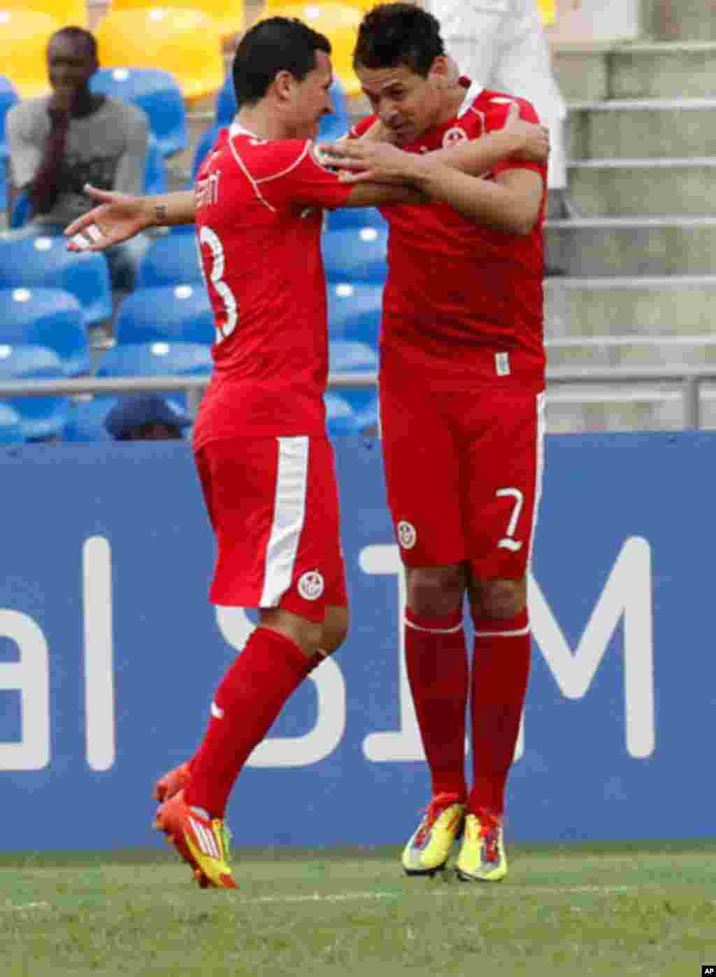 Tunisia's Msakni celebrates his goal with Yahia during their African Cup of Nations soccer match against Niger in Libreville