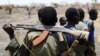 A South Sudanese army soldier holds his rifle near an oil field in Unity State April 22, 2012. South Sudan says it has withdrawn thousands of troops from the disputed border area. (Reuters)