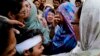 Pakistanis Bury Children Killed in Terror Attack