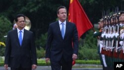 British PM David Cameron, right, seen here with Vietnamese PM Nguyen Tan Dung, toured Asia this week, calling for increased anti-corruption as a means to boost trade.