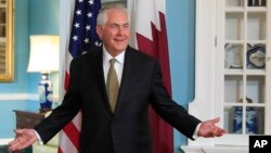 Secretary of State Rex Tillerson gestures as he responds to a reporter's question during a meeting with Qatar's Foreign Minister Sheikh Mohammed bin Abdulrahman Al Thani at the State Department in Washington, July 26, 2017. Tillerson surprised reporters A
