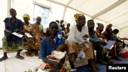 Congolese patients wait to be treated at a hospital run by Medecins Sans Frontieres in Bunia, Democratic Republic of Congo.