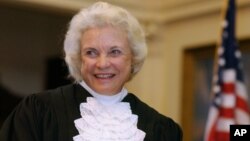FILE - U.S. Supreme Court Justice Sandra Day O'Connor is shown before administering the oath of office to members of the Texas Supreme Court in Austin, Texas, Jan. 6, 2003.