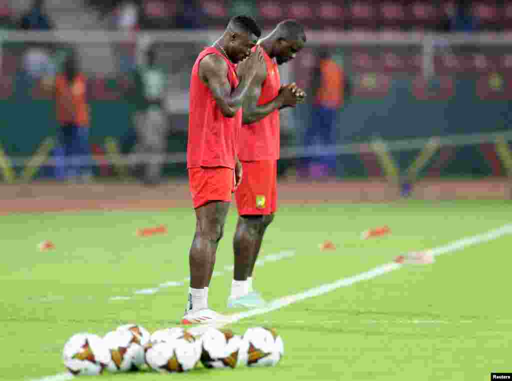 Cameroon players during the warm up before the round of 16 match opposing them to the Comoros in Yaounde, Cameroon, Jan. 24, 2022.