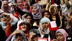 Egyptian women chant slogans as they attend a demonstration in Tahrir Square in Cairo, Egypt, April 1, 2011
