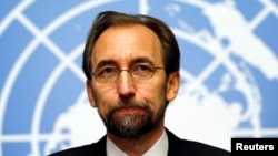 FILE - Jordan's Prince Zeid Ra'ad Zeid al-Hussein, U.N. High Commissioner for Human Rights, pauses during a news conference at the United Nations European headquarters in Geneva, Oct. 16, 2014.