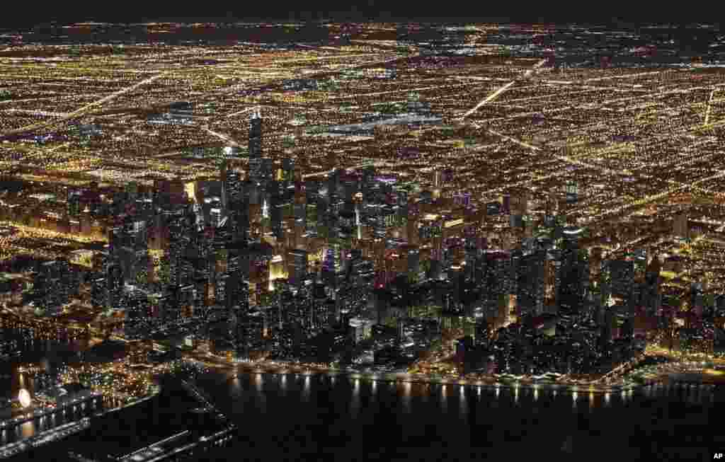 An aerial view of the downtown Chicago, Illinois skyline, on the night of Nov. 24, 2013