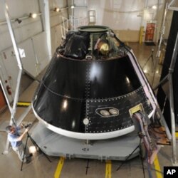 The Multi-Purpose Crew Vehicle being assembled and tested at Lockheed Martin's Vertical Testing Facility in Colorado.