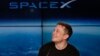 FILE- Elon Musk, founder, CEO, and lead designer of SpaceX, speaks at a news conference after the Falcon 9 SpaceX heavy rocket launched successfully from the Kennedy Space Center in Cape Canaveral, Florida on Feb. 6, 2018.