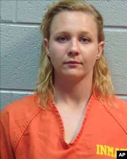 FILE - Reality Winner is seen in a June 2017 photo released by the Lincoln County, Georgia, Sheriff's Office.