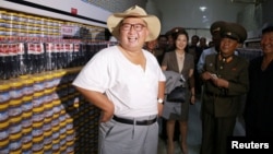 North Korean leader Kim Jong Un visits a factory in this undated photo released by North Korea's Korean Central News Agency, Aug. 7, 2018.