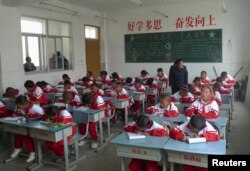 Children attend a Tibetan language class at a school in Shigatse