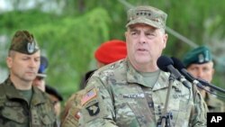 FILE - U.S. Army Chief of Staff General Mark Milley speaks during the opening ceremony of the Anaconda-16 military exercise, in Warsaw, Poland, June 6, 2016.