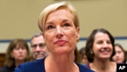 FILE - Planned Parenthood President Cecile Richards, shown testifying before Congress in September, says her organization changed its policy "to take away any basis for attacking Planned Parenthood to advance an anti-abortion political agenda."