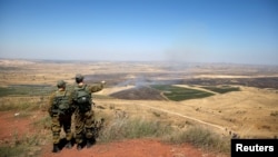 Tư liệu - Binh lính Israel chìn sang phía Cao nguyên Golan thuộc Syria từ biên giới Israel-Syria trên phần Cao nguyên Golan do Israel chiếm đóng, Israel, ngày 7 tháng 7, 2018.