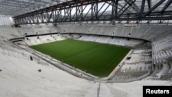 General view of the interior of Arena da Baixada soccer stadium as it is being built to host matches of the 2014 World Cup in Curitiba, Brazil, Feb. 17, 2014.
