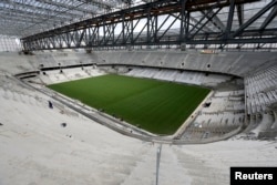 General view of the interior of Arena da Baixada soccer stadium as it is being built to host matches of the 2014 World Cup in Curitiba, Brazil, Feb. 17, 2014.