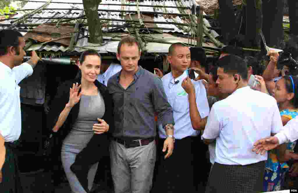 Daw Aung San Suu Kyi and Hollywood atress Angelina Jolie Pitt, United Nations High Commissioner for Refugees special envoy and co-founder of the Preventing Sexual Violence Initiative,visits Yangon, Hlaing Tharyar industrial area to study female workers a