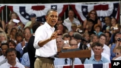 President Barack Obama speaks during a town hall-style meeting in Cannon Falls, Minnesota, August 15, 2011.