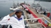 FILE PHOTO - A Cambodian Navy sailor salutes on a Chinese naval patrol boat during a handover ceremony at a Cambodian naval base at Ream in Sihanoukville province, southwest of Phnom Penh, November 7, 2007. (REUTERS/Chor Sokunthea)