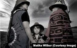 Darkfeather, Bibiana and Eckos Ancheta from the Tulalip Tribe. (Photo by Matika Wilbur)