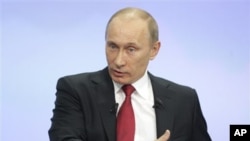 Russia's Prime Minister Vladimir Putin during a call-in session broadcast live on Russian state television and radio in Moscow, 16 Dec 2010