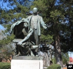 This statue, titled, “Lifting the Veil,” is a centerpiece of the Tuskegee campus. It depicts Booker T. Washington lifting the veil of ignorance from a former slave.