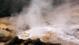 FILE PHOTO: Polluted water flows out of pipes from a rare earth factory near Baotou, a city in China's Inner Mongolia Autonomous Region in this picture from 2010. (Reuters)ure.