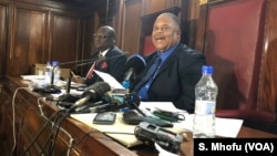 Japhet Murenje, the head of nomination court in Harare on June, 14, 2018, announces the names of the candidates who will run for Zimbabwe’s presidency in the July 30 general election. 