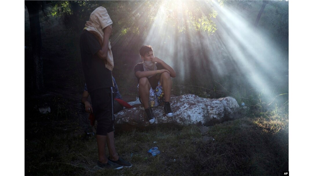 Supporters of presidential candidate Salvador Nasralla rest next to their roadblock as they protest what they call electoral fraud in Tegucigalpa, Honduras, Dec. 1, 2017.