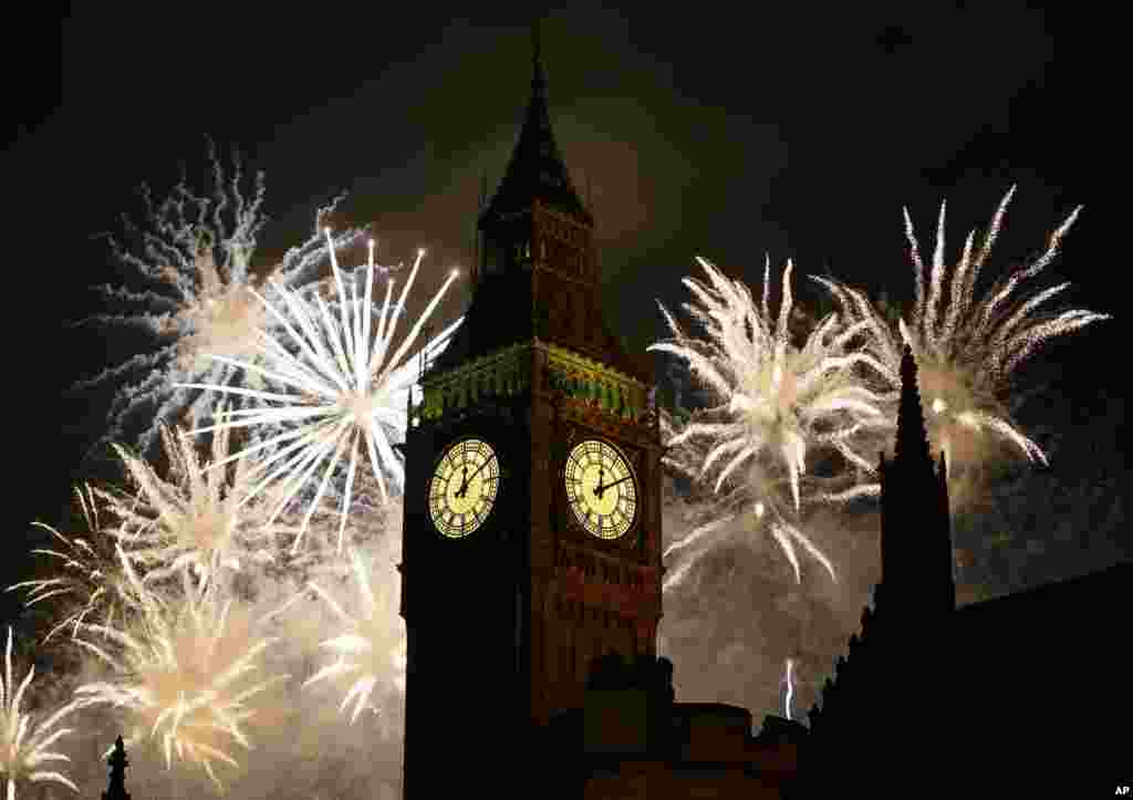 Fireworks explode over Elizabeth Tower housing the Big Ben clock to celebrate the New Year in London, Jan. 1, 2013.