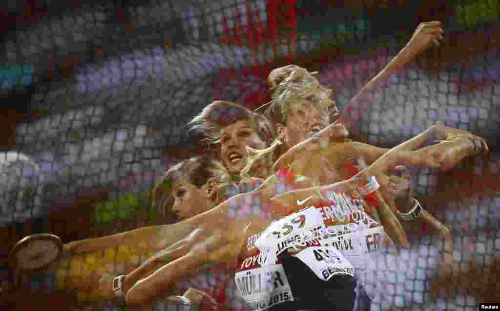 Nadine Mueller of Germany competes to win the bronze medal in the women's discus throw final during the 15th IAAF World Championships at the National Stadium in Beijing, China.