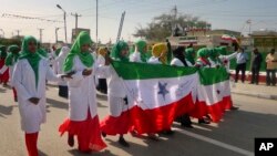 Women march in a procession to celebrate the 25th anniversary of proclaimed independence in the capital Hargeisa, Somaliland, a breakaway region of Somalia, May 18, 2016.