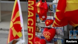 Souvenirs with the flag and name of Macedonia written on them are displayed in Skopje, Macedonia, Jan. 10, 2018.