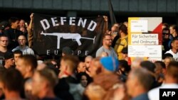 People demonstrate on Aug. 27, 2018 in Chemnitz, eastern Germany, following the death of a 35-year-old German national who died in hospital after a "dispute between several people of different nationalities," according to the police.