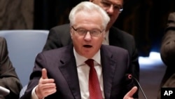 FILE - Russia's U.N. ambassador, Vitaly Churkin, shown addressing the Security Council in May 2014, says Turkey acted "recklessly" in deploying troops to Iraq.