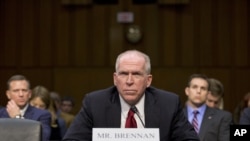 CIA Director nominee John Brennan defends President Barack Obama’s policies in the war on terror as he testifies on Capitol Hill in Washington, Feb. 7, 2013.