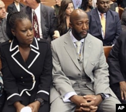 The parents of Trayvon Martin, Sybrina Fulton, left, and Tracy Martin, sit in the courtroom, April 20, 2012, during a bond hearing for George Zimmerman in Sanford, Florida.